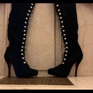 Christian Louboutin thigh high button up suede boots.